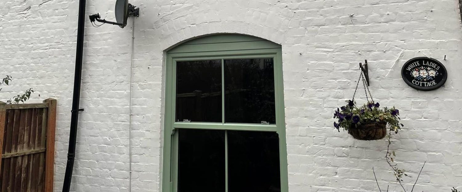 Image of windows in sage colour