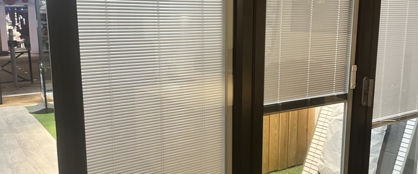 Image showing blinds fitted between glass in various positions 