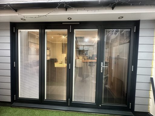 bifold doors with blinds fitted in the glass